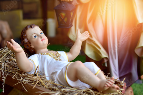 Wallpaper Mural Statuettes of baby Jesus,The birthday of Jesus is a statuette of Maria with Joseph and newborn Jesus on the hay, A Christmas nativity scene. Torontodigital.ca