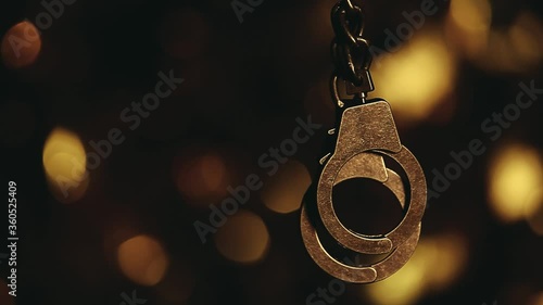 footage of handcuff dark background  photo