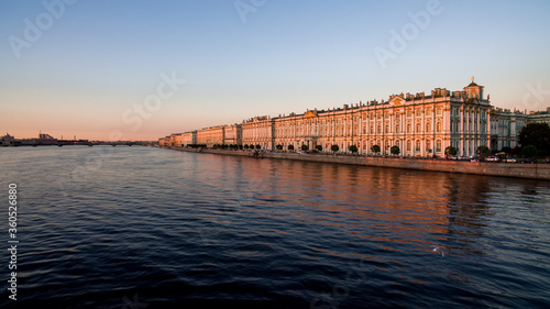 View Hermitage museum. Neva river and Winter Palace. White night. Unique urban landscape center Saint Petersburg. Central historical sights city. Top tourist places in Russia. Capital Russian Empire © Alex Vog