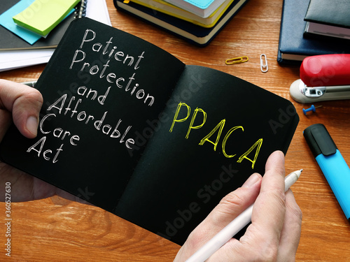 Patient Protection and Affordable Care Act PPACA is shown on the business photo photo