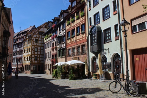 Beautiful street of half timbered houses and the bicycle in the Old Town of Nuremberg