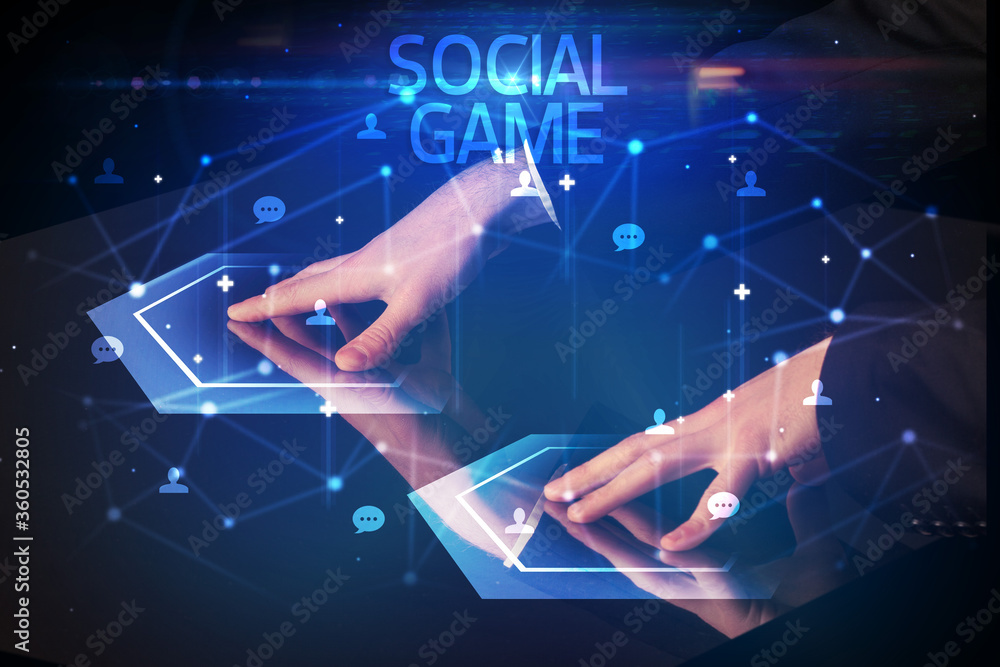 Navigating social networking with SOCIAL GAME inscription, new media concept Navigating social networking with SOCIAL GAME inscription, new media concept