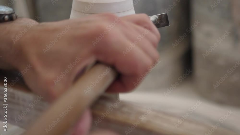 man modeling ceramic casting pottery with tools on a wheel slow motion man modeling ceramic casting pottery with tools on a wheel slow motion