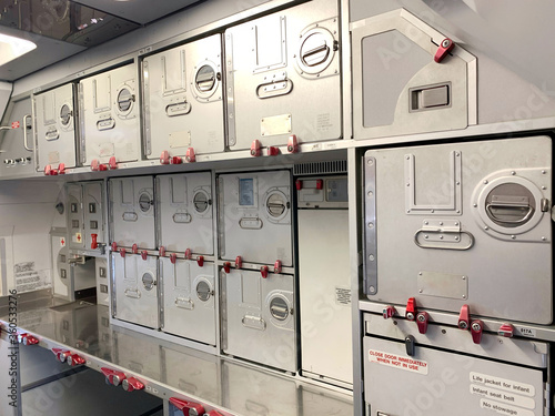 Aircraft aft galley with full of storage unit.