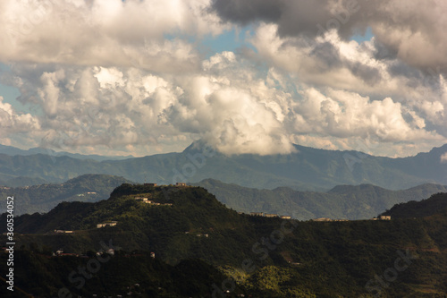 Dramatic clouds over hills around the city of Aizawl in Mizoram in Northeast India.