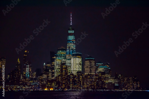Winter cruise . New York City skyline by night. View from Hudson river, New York, USA, America.  © elephotos