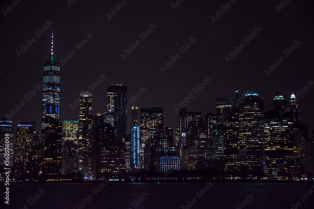 Winter cruise . New York City skyline by night. View from Hudson river, New York, USA, America. 