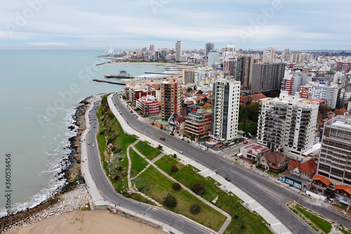 Aerial view from drone of panoramic cityscape of Mar del Plata city. Paseo Davila road along coastline. Argentina. photo