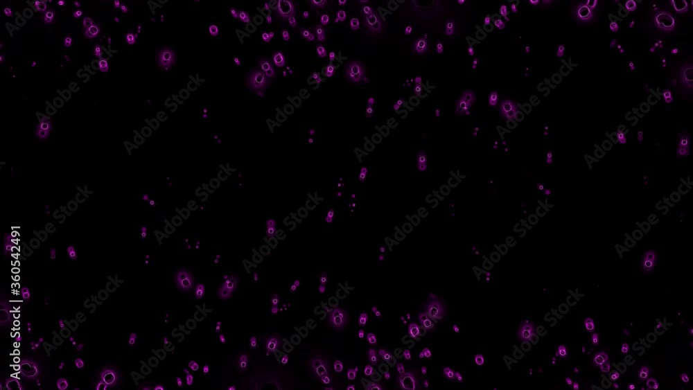 Violet particles on black background Violet particles on black background