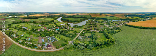 the Levchenko village   Krasnodar Territory  South of Russia  - the winding Kipili River and wheat fields on a hot June day