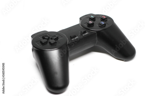 Isolated black game controller.