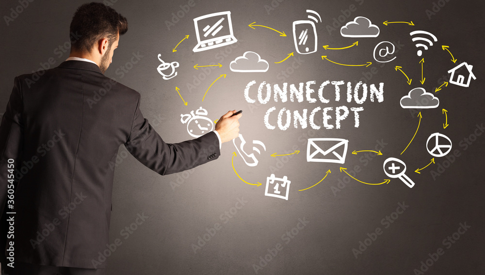 businessman drawing social media icons with CONNECTION CONCEPT inscription, new media concept businessman drawing social media icons with CONNECTION CONCEPT inscription, new media concept