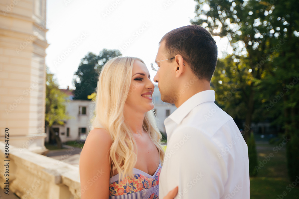 Beautiful couple in love dating outdoors and smiling