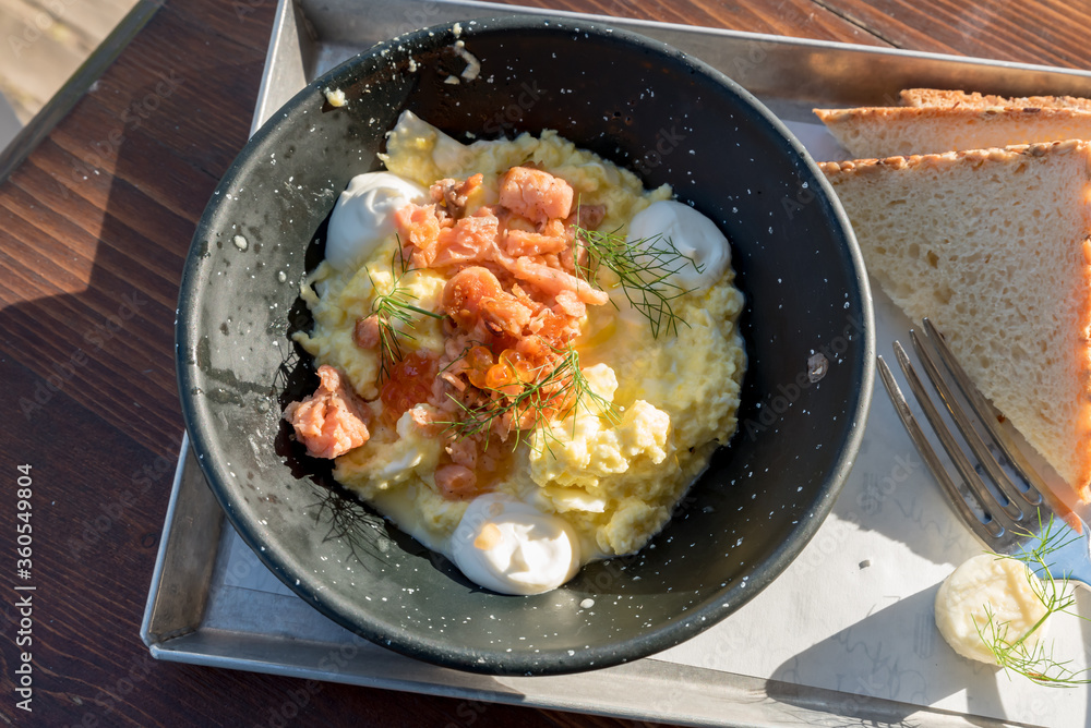 Scrambled eggs with salmon and chives Scrambled eggs with salmon and chives