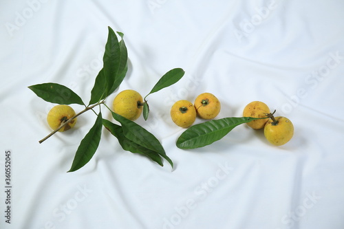 Wallpaper Mural Fresh ripe tasty eggfruits with leaves isolated on white background Torontodigital.ca