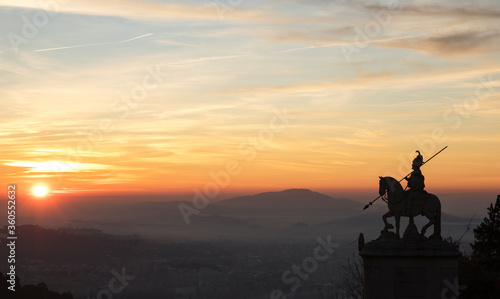 Sunset silhouette of sculpture of St Longinus in famous sanctuary Bom Jesus Monte near Braga city in historical Minho Province  Portugal