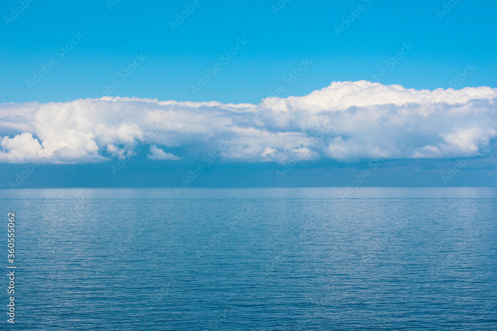 Beautiful ocean background. Blue background of the sea. Nature. Rest by the sea. Blue sky. Beautiful ocean background. Blue background of the sea. Nature. Rest by the sea. Blue sky.