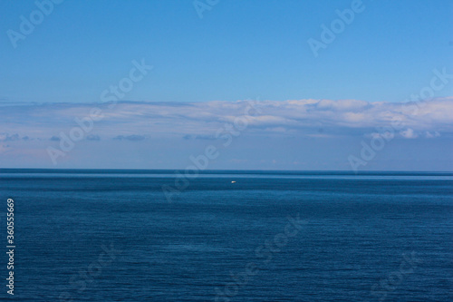 Fototapeta Naklejka Na Ścianę i Meble -  Beautiful ocean background. Blue background of the sea. Nature. Rest by the sea. Blue sky.