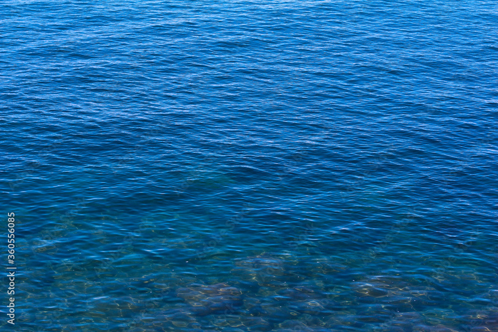 Obraz premium Beautiful ocean background. Blue background of the sea. Nature. Rest by the sea. Blue sky.