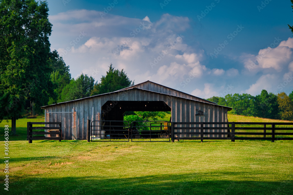 horse barn with a beautiful blue sky