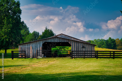 horse barn with a beautiful blue sky