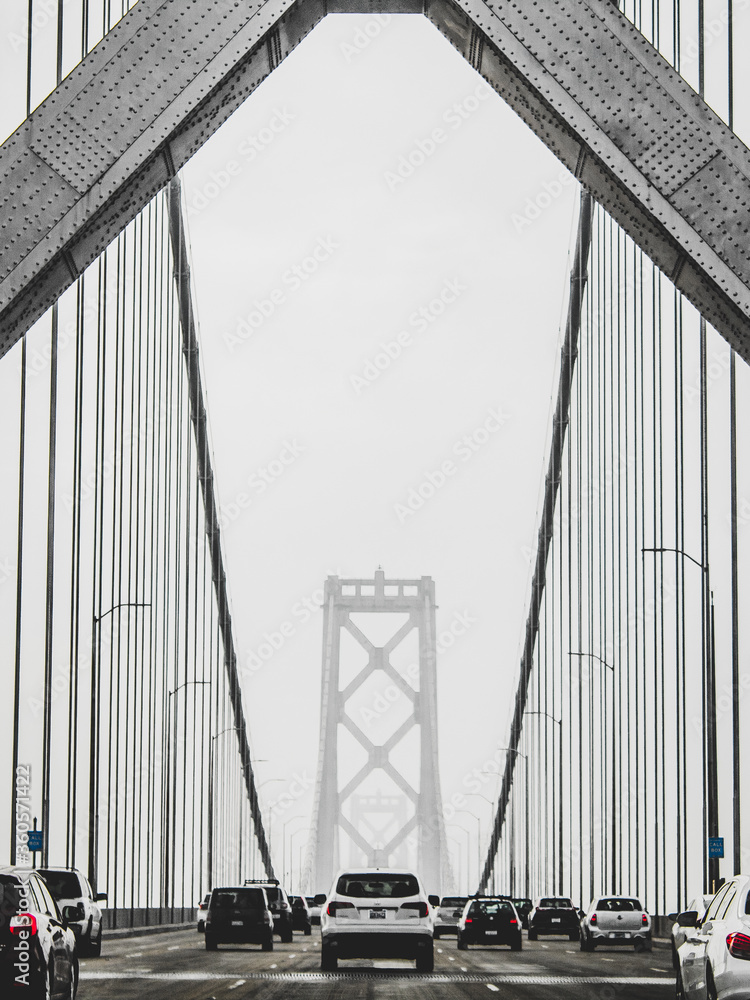 Naklejka premium The Bay Bridge on a foggy afternoon