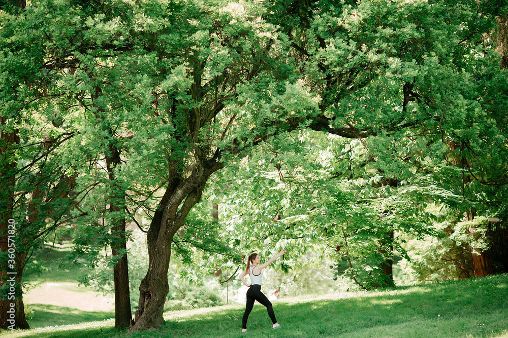 girl goes in for sports in the park of europe girl goes in for sports in the park of europe