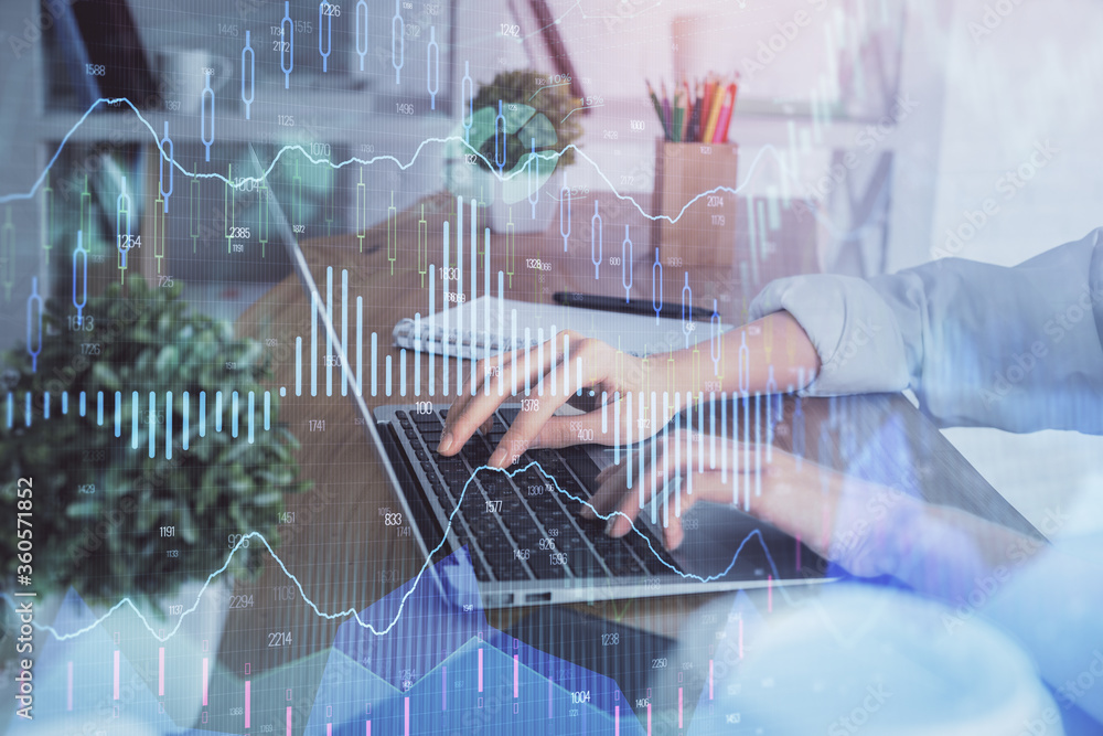 Double exposure of woman hands typing on computer and forex chart hologram drawing. Stock market invest concept. Double exposure of woman hands typing on computer and forex chart hologram drawing. Stock market invest concept.