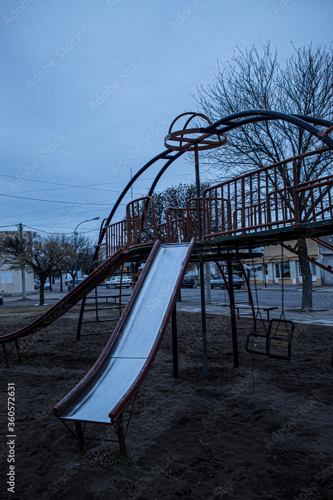 large metal and wood slide of various colors such as blue, red, orange and yellow
large metal and wood slide of various colors such as blue, red, orange and yellow