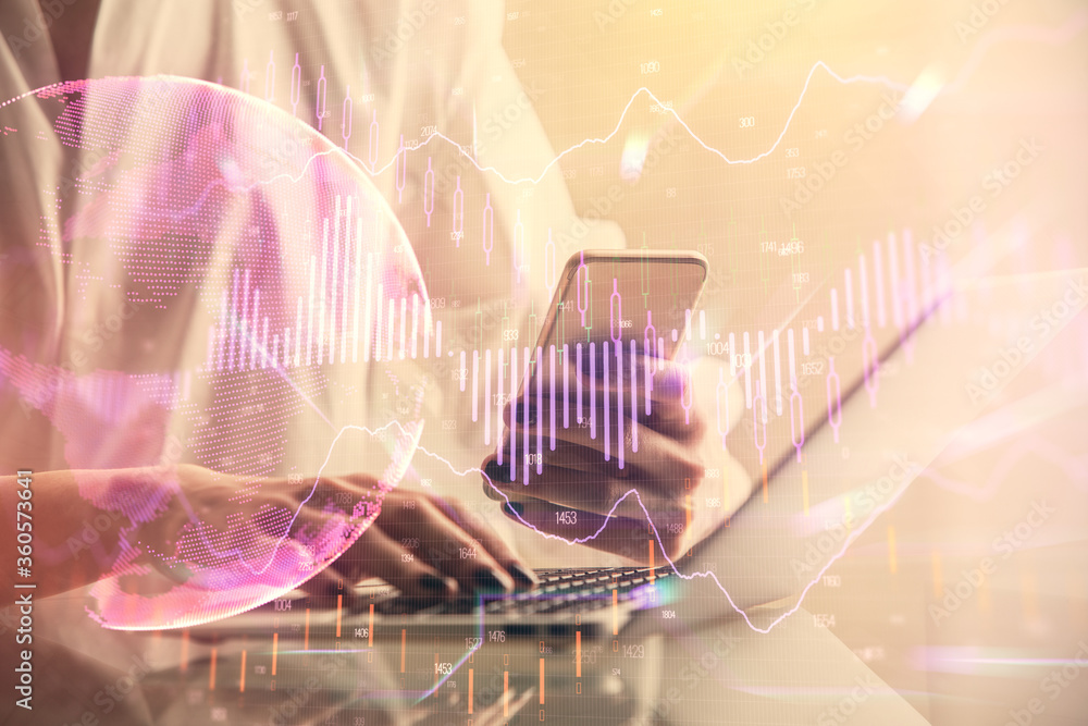 Double exposure of financial graph sketch hologram and woman holding and using a mobile device. Stock exchange concept. Double exposure of financial graph sketch hologram and woman holding and using a mobile device. Stock exchange concept.