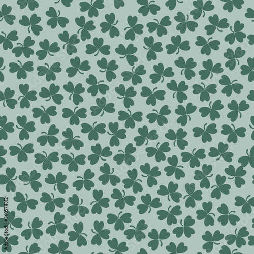 Green clover leaves mosaic texture isolated on white background. Happy St. Patrick's Day shamrock wallpaper. Seamless pattern. Abstract geometric shapes vector illustration