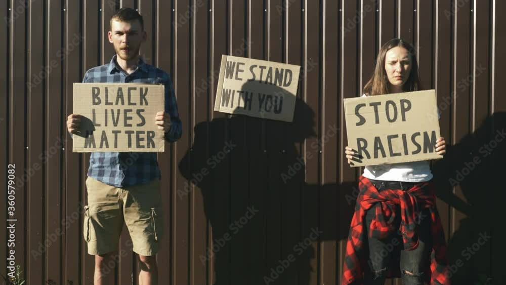 Poster Protesting Racisim People with cardboard posters