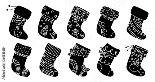 Christmas socks flat silhouette set. Black glyph cartoon holiday traditional and ornate stockings. Christmas socks for gift, decorated holly, patterns. New Year design collection. Vector illustration