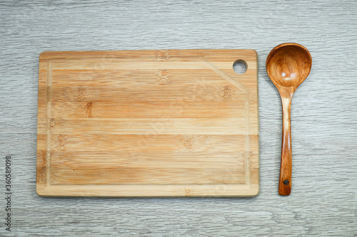 wooden spoon and wooden kitchen board