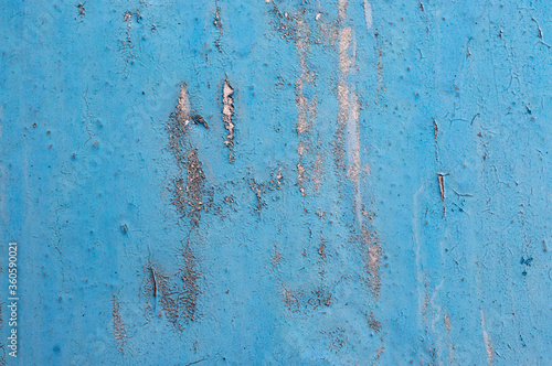 old blue rusty sheet metal with rivets