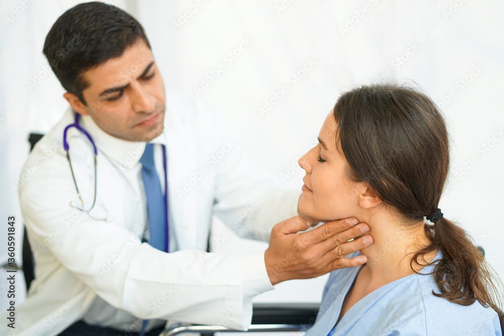 The doctor examined the female patients with neck pain in the hospital. The doctor examined the female patients with neck pain in the hospital.