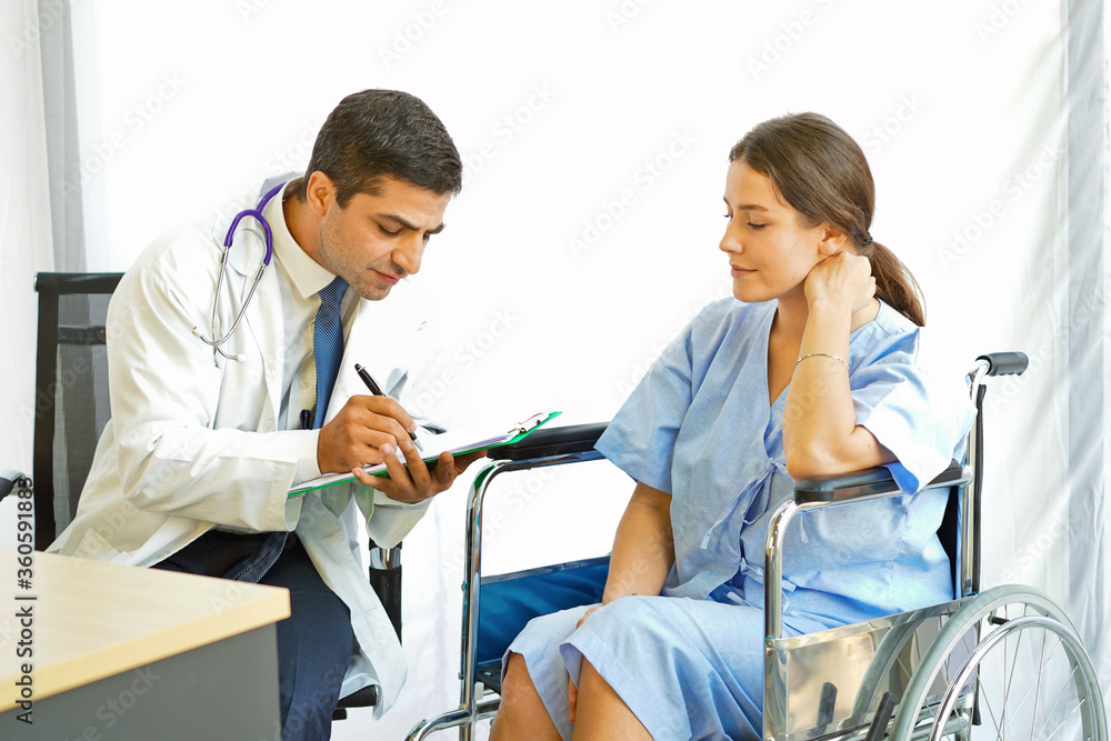 Mature doctor talking with patient in the Hospital. Mature doctor talking with patient in the Hospital.