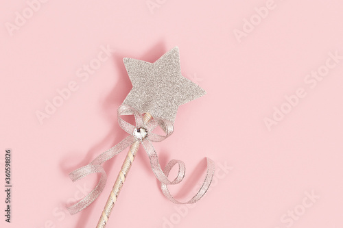 Wallpaper Mural Glowing, glittering star on pink background with copy space. Magic star, fulfillment of wishes, dreams. Romantic atmosphere concept. Minimal style. Torontodigital.ca