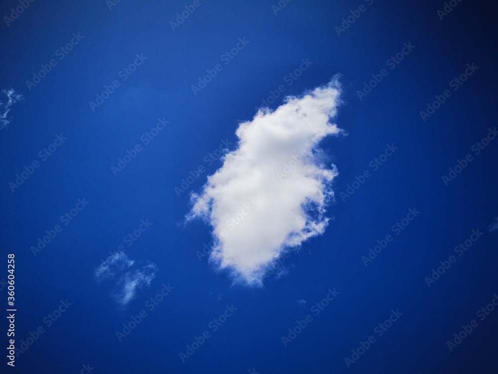 White clouds floating in the blue sky. White clouds floating in the blue sky.