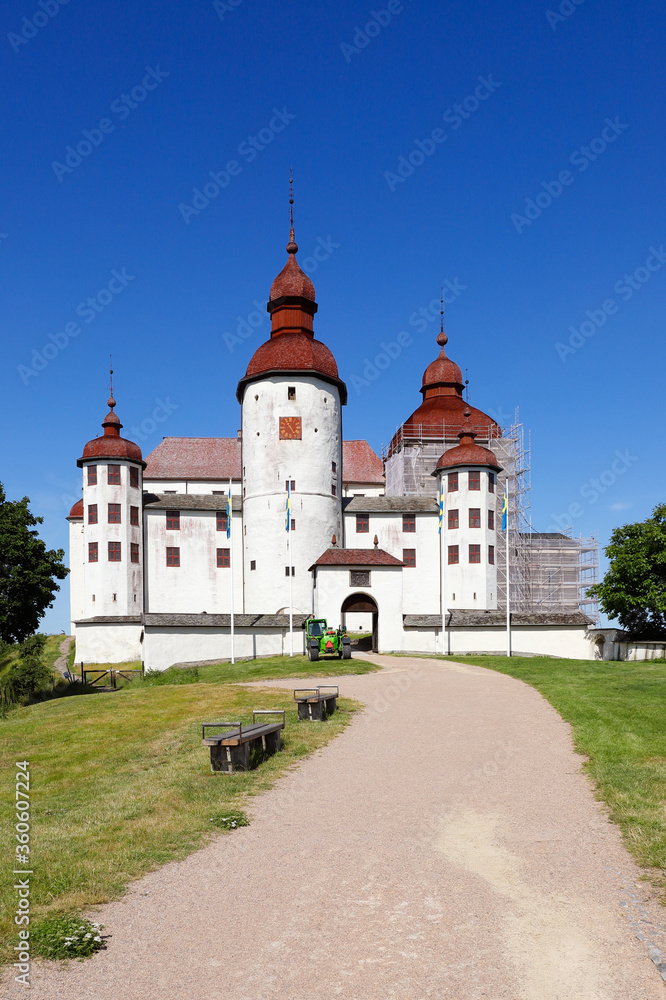 The walkway leads to the medieval Lacko Castle's main gate located in Swedish province of Vastergotland.