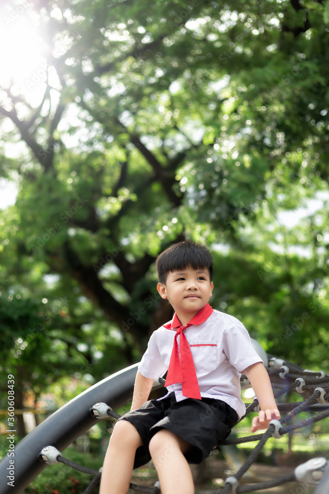 Happy cute little child playing in the park outdoors Happy cute little child playing in the park outdoors