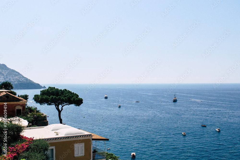 Azure sea on Amalfi Coast in Positano, Italy