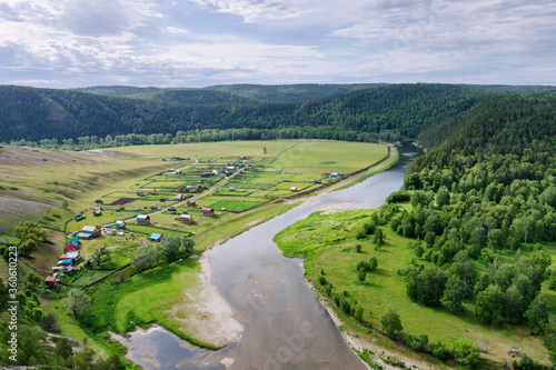 Ural landscape. Aerial view of Belaya river and Ishdavletovo village. Bashkiria national park, Bashkortostan, Russia.