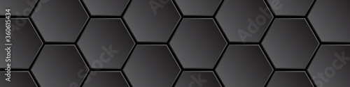 Dark honeycombs on a black background. Polygonal texture. Hi-tech abstract background with honeycomb elements.
