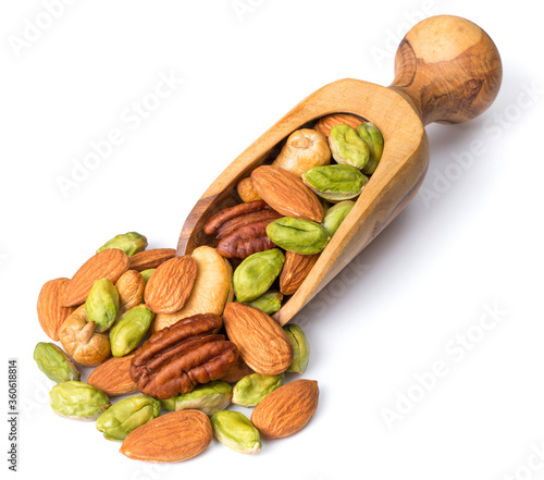 unsalted mixed nuts in the wooden scoop, isolated on white background