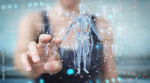 Woman using digital x-ray human body holographic scan projection 3D rendering