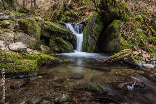 Fototapeta Naklejka Na Ścianę i Meble -  little beautiful waterfall with a stonestage an moss