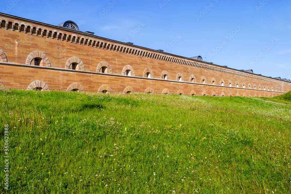 Very long fortified wall with cannon ports