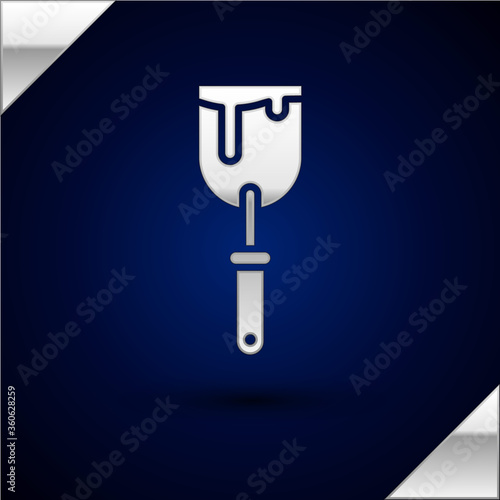 Silver Putty knife icon isolated on dark blue background. Spatula repair tool. Spackling or paint instruments. Vector Illustration.