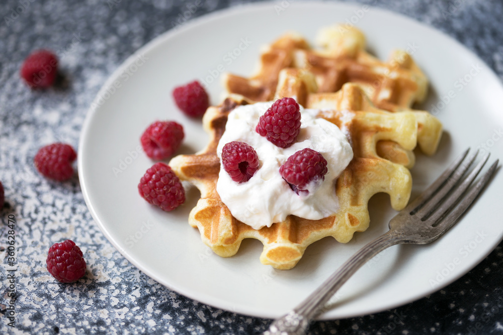 Belgian waffles with raspberries Belgian waffles with raspberries